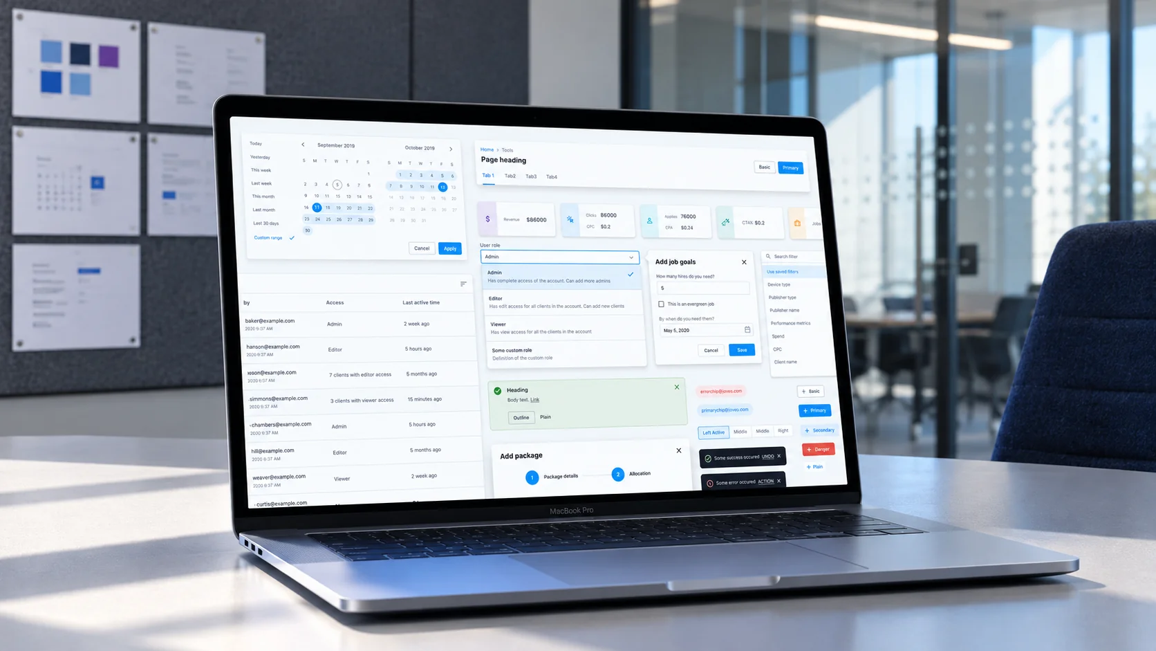 IRIS component library presented on a MacBook in a product design studio.